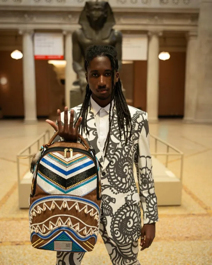THE MET KUBA KINGDOM HEADDRESS BACKPACK Bags SPRAYGROUND