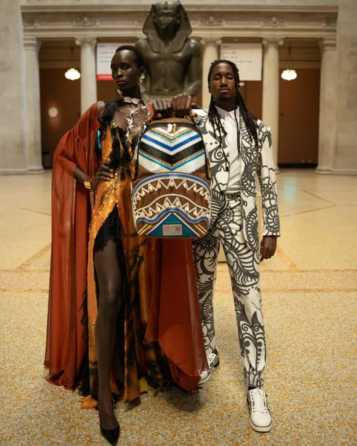 THE MET KUBA KINGDOM HEADDRESS BACKPACK Bags SPRAYGROUND